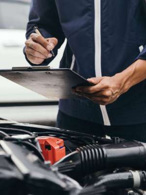 Automobile mechanic repairman hands repairing a car engine automotive workshop with a wrench, car service and maintenance,Repair service.